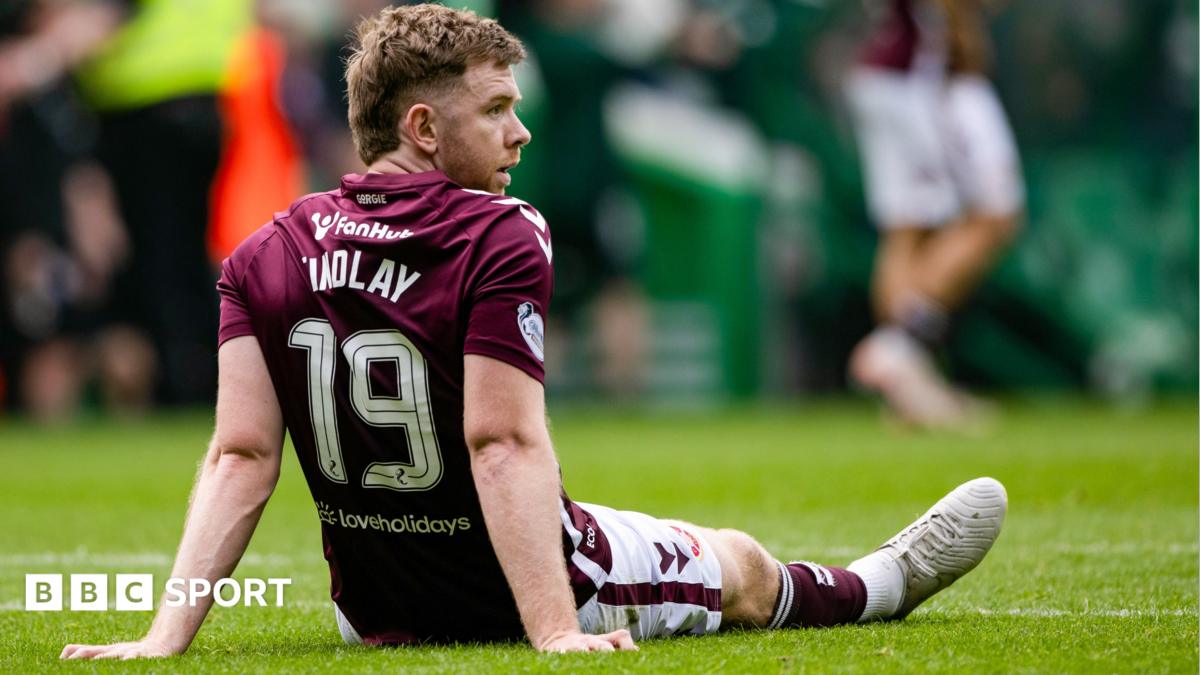 Stuart Findlay dejected on the Celtic Park turf