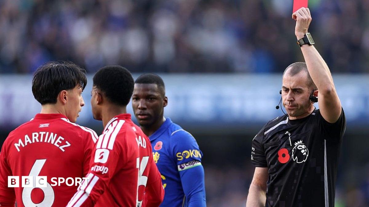 Manchester United defender Lisandro Martinez is shown a red card by referee Peter Bankes