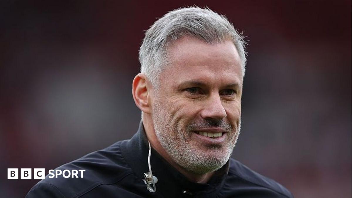 Jamie Carragher smiles during commentary